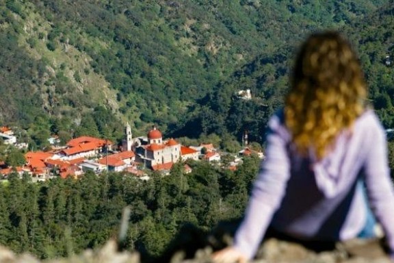 a person with a mountain in the background